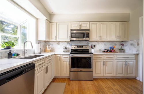 Cheboygan House | Cheboygan River glow with fire pit/game room/hot tub! min to boat launch/beaches