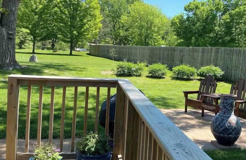 Council Bluffs House | Cheerful two bedroom home in quiet neighborhood. Sun Porch ~ Patio ~ Large yard