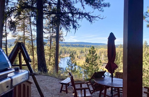McCall House | Come enjoy spectacular river views from this gorgeous Payette River home, where comfort meets nature