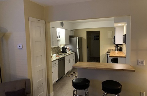 Lansing House | Cottage11: 2 Bedroom-3 beds. Laundry, Sleeps 6. Park right at your Entry Door.