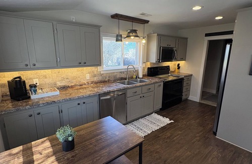 Rexburg House | Country living house 5 min to sand dunes with large patio, hot tub, and fire pit