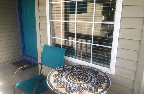 Collister House | Cozy 4 bedroom home close to foothils, garden space, trees, fenced yard, garage