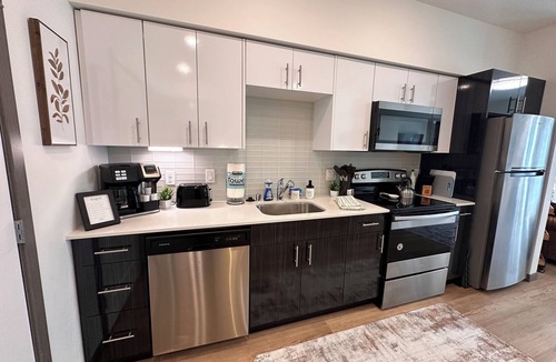 Central Tacoma Apartment | Cozy apartment with Rooftop views, home workspace and close to Hospitals!