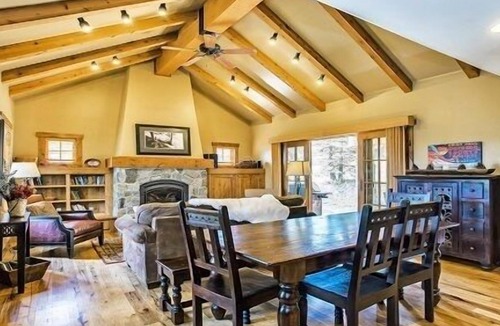 Tamarack Resort Cottage | Cozy Living Room w/ Stone Fireplace | Private Hot Tub & Patio | Vaulted Ceilings