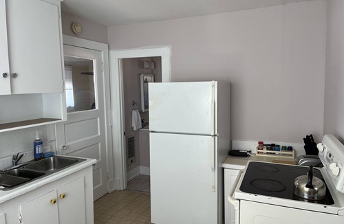 South End Cottage | Cozy pet friendly cottage nestled a quiet backyard.