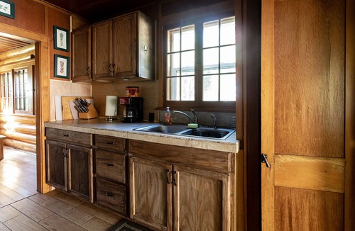 Idaho City Cabin | Creekside log cabin nestled between the pines of Idaho City