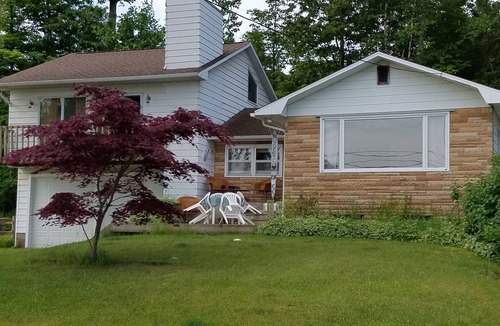 Beulah Cottage | Crystal Lake Lakefront - Private Dock + Patio - Sleeps 9 - 2-Tier Deck - Kayak