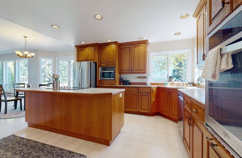 Oak Harbor House | Designer bay-view estate with home office, beach nearby