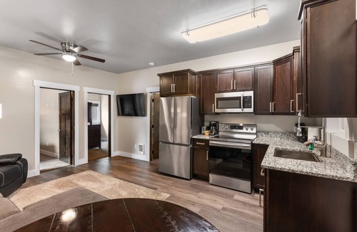 West Yellowstone Apartment | Discover The Yellowstone Hideaway Unit C, a cozy 2-bed retreat just 1 minute from Yellowstone!