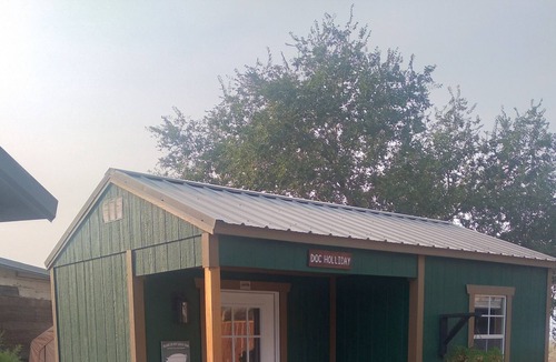 Imlay Cabin | Doc Holliday, has a double bed, sleeps 2 and has a detached private bathroom.