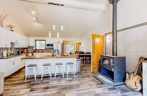 Trestle Creek House | Dog-friendly, creekside home with hot tub, sauna & firepit - walk to the lake