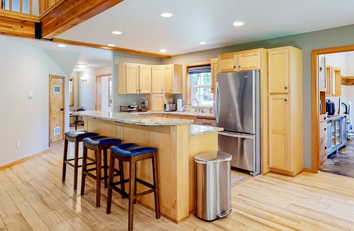 Sandpoint House | Dog-friendly lake stay with covered patio, grill, wood stove, W/D & board games