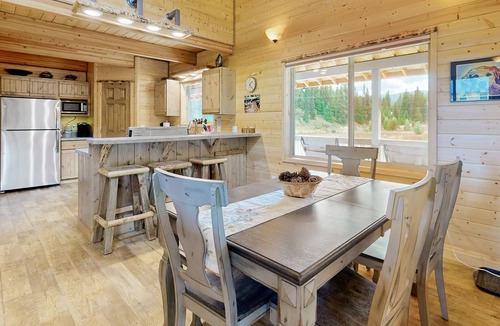 Dixie House | Dog-friendly riverfront home near town with deck, water views, & fireplace
