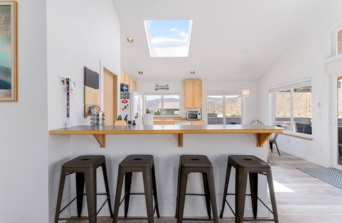 Orondo House | Drift Away Lake House | House in Orondo with lake view deck, pool, putting green