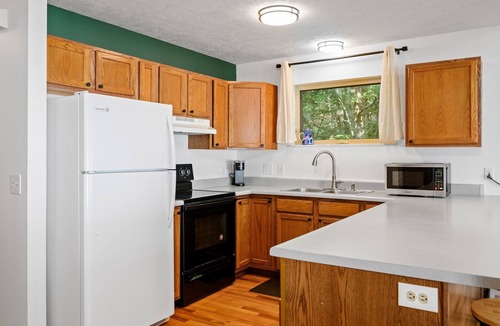 Traverse City Cottage | East Beach Cottage: Sandy | Secluded | 3 King Beds
