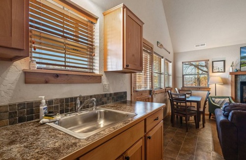 Dover Bay House | Embrace lakeside serenity at this cozy Dover Bay bungalow, just steps from the water, perfect for couples or families seeking peaceful Idaho charm.
