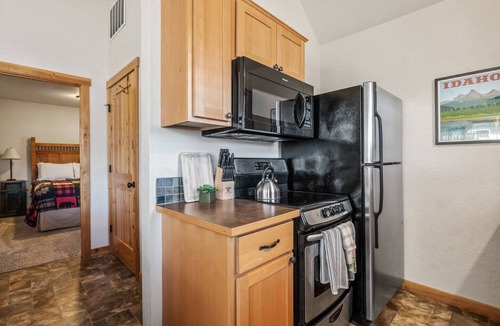 Dover Bay House | Enjoy lake life your way at this inviting Dover Bay bungalow, perfect for boating days, sunset walks, and cozy evenings in!