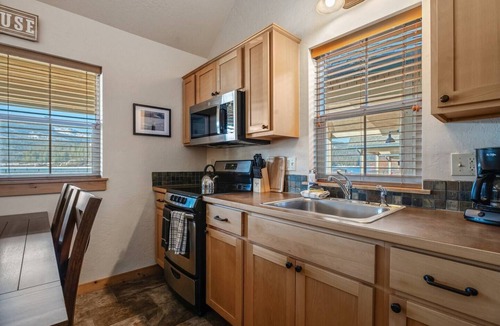 Dover Bay House | Escape the everyday at this peaceful retreat near the water. Perfect for families seeking relaxation, outdoor fun, and lakeside charm.
