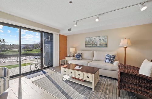 Charlevoix Condo | EWI 117A Waterfront Access | Pool, Hot Tub, Sauna | Sleeps 4