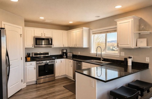Moab South Valley House | Exclusive Retreats 6 Bedroom 6 Bath Desert Paradise with Private Heated Pool