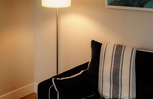 Elk Rapids Apartment | Executive Suite - 1 King | Sleeper Sofa | Balcony