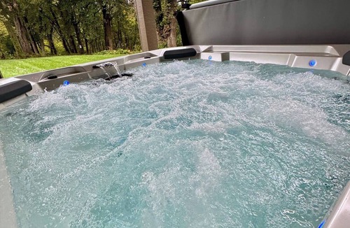 Grimes House | Expansive 7-acre private estate with hot tub, pond, and curated gathering spaces. Designed for elevated group stays with comfort and privacy.
