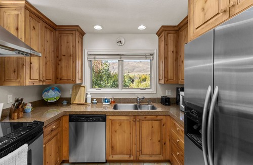 Elkhorn Village Condo | Fairway Haven with Private hot tub! Dog Friendly!