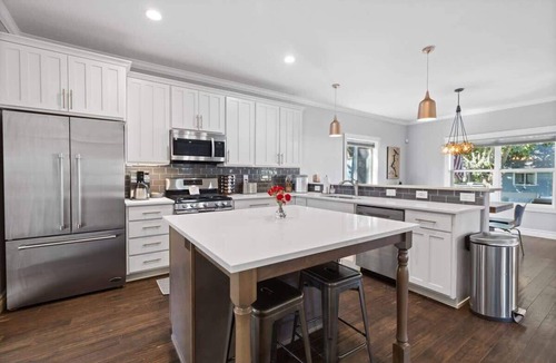 Coeur d'Alene House | Family fun home with hot tub, arcade and zipline