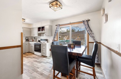 North Central Omaha House | Family-sized home with outdoor pool and deck