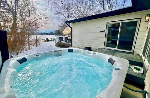Commerce Township House | Fox Lake Retreat | Dock, Hot Tub, Sauna & Gameroom