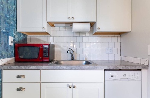 Washington Park Apartment | Grandmillennial-Style | UW Cap Hill | EV Charging