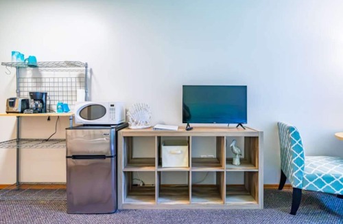 Oscoda Apartment | Guest Room #12 New Beginnings