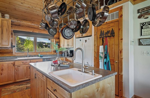 West Yellowstone Cabin | Hebgen Paradise Lodge: Spacious 5BR retreat 20 min from Yellowstone, perfect for 15 guests.