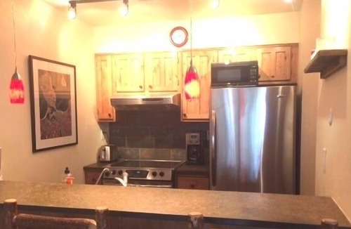 Big Sky Condo | High End Condo Just steps from the Slopes, Private Hot Tub