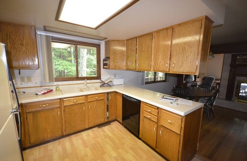 Traverse City House | House on sandy beach in Omena. Budget friendly. Dog ok. Sunrise views.