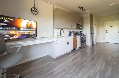 Boise Apartment | Iconic Nike Studio & Romantic Canopy Glow