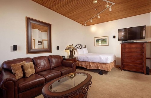 Downtown Hotel | Independence Square Unit 306 | Hotel Room with Large Sitting Area & Wet Bar