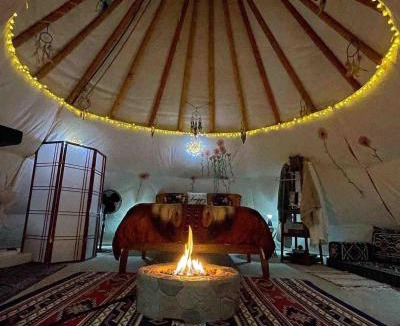 Leland Other | Indulge in the ultimate Glamping experience with our Luxury Tipi packages featuring four unique sites with private decks, indoor and outdoor fire pits, and exclusive access to 155 acres of private hiking trails