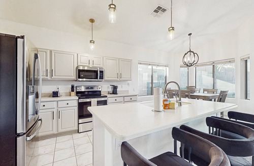 Foothills House | Inviting home with pool, hot tub, enclosed yard, fast WiFi, & W/D