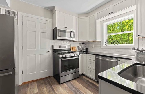 Lakeside House | Juniper Presents: Classic Cottage w Hot Tub, Steps from the Beach