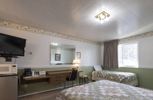 Frontier House | KABINO: Fossil Butte Motel #11 King A/C Mini Fridge Microwave Cable Wifi