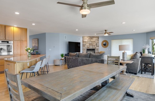 Manson House | Lake & mountain view home with hot tub, pool, 2 decks, game room, & fireplace