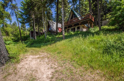 Coeur d'Alene Cabin | Lakefront cabin with huge deck, private dock, & great views