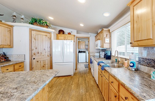 Spirit Lake House | Lakefront, dog-friendly home with dock, great porch & gorgeous views