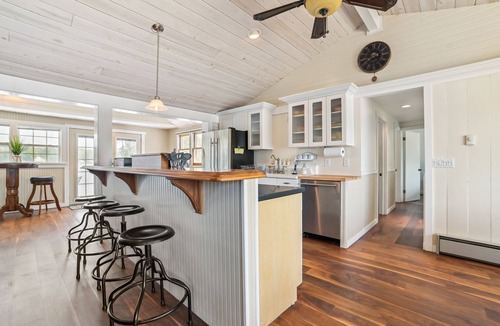 Gladwin House | Lakefront Gladwin Vacation Rental w/Deck & Dock!
