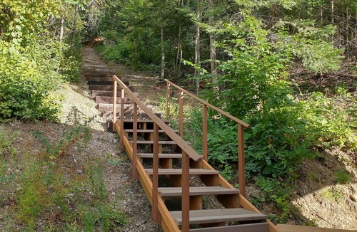 Spirit Lake Cabin | Lakefront guest house, dock access. Kayak, peddleboat, and rowboat. fishing.