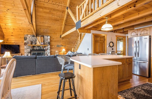 Gladwin Cottage | Lakefront Log Cabin - Sunset + Docks & Outdoor Fun
