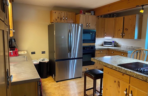 Mayfield House | Large Lakefront House 20 Minutes from Downtown Traverse City ~ Includes pontoon.