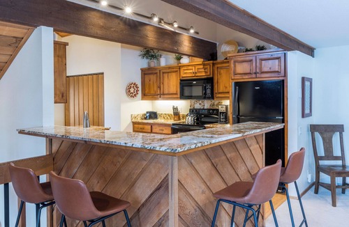 Elkhorn Village House | Loft Area! Golf Course Views! Shuffleboard Table! Hot Tub Access!