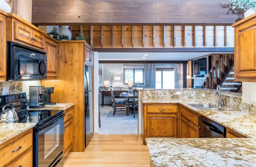 Elkhorn Village House | Loft Area! Golf Course Views! Shuffleboard Table! Hot Tub Access!